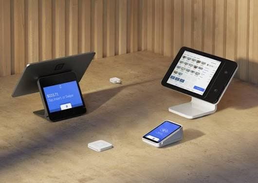 Square stands and reader on a café counter